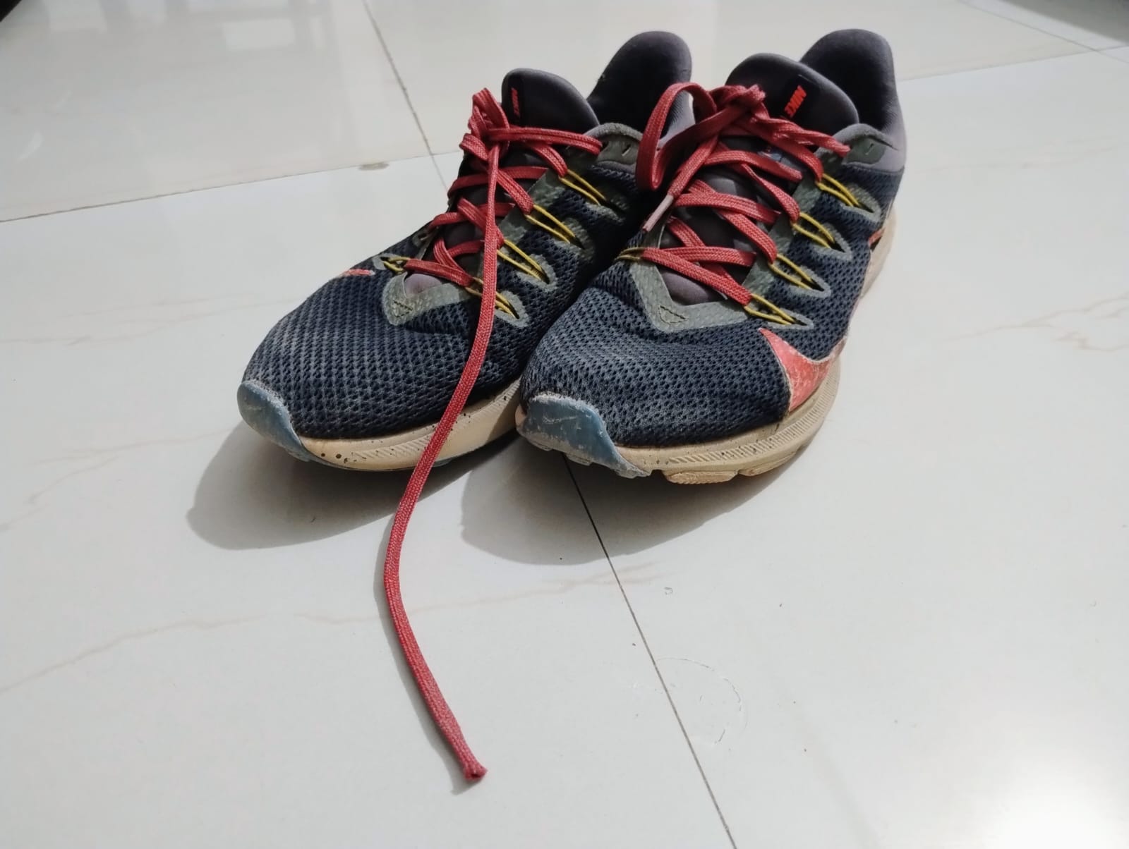 A pair of dusty shoes